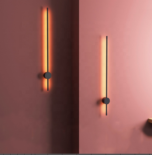 Modern LED wall lamps for living room decoration on pink wall.