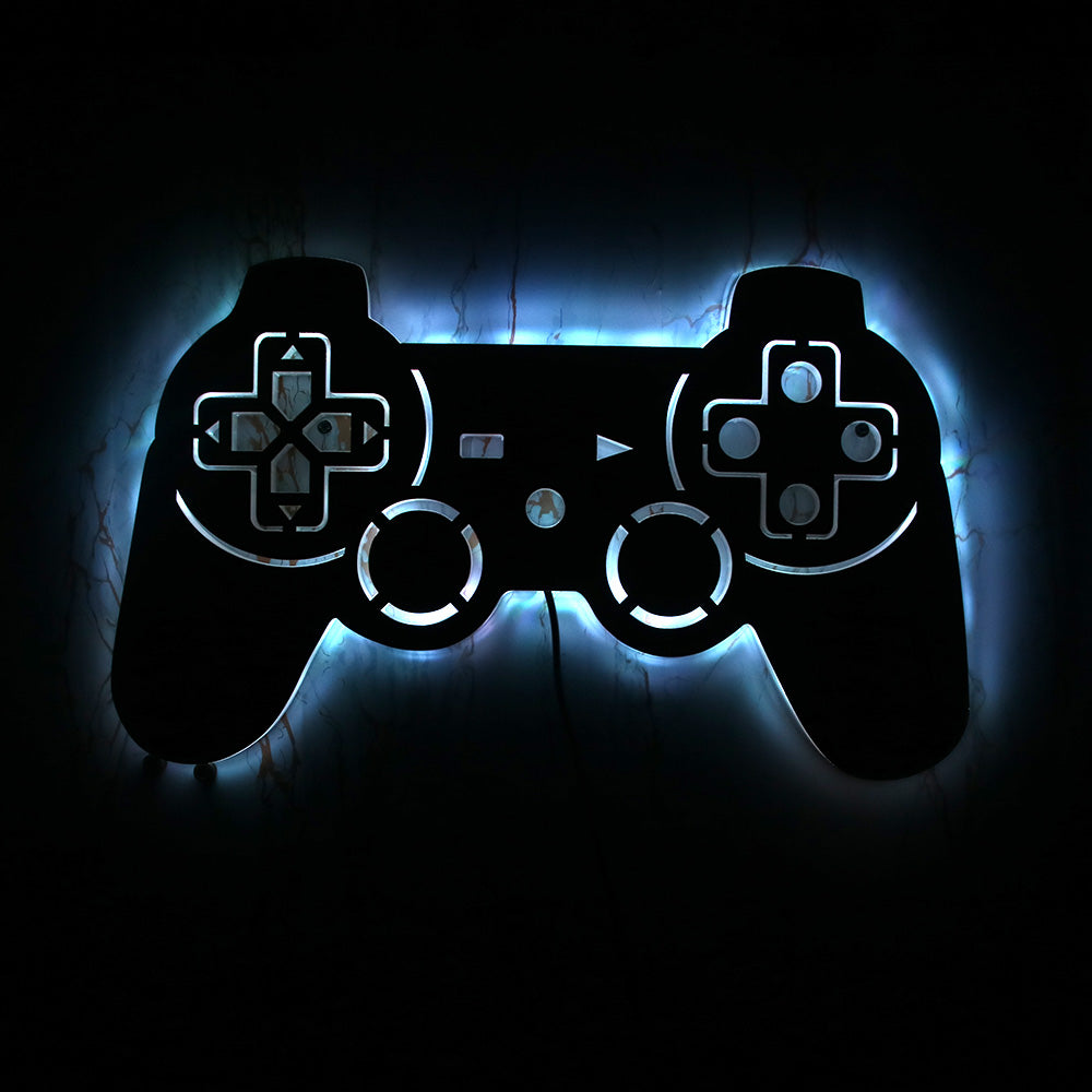 Gamers wall decoration lamp shaped like a gamepad controller, illuminated with a blue glow.