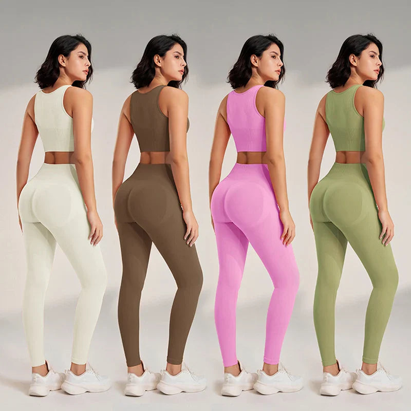 Women's high waisted seamless yoga clothing set with leggings and sleeveless tops in various colors.