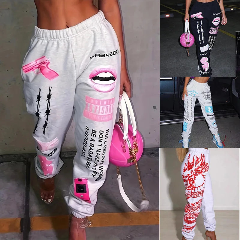 Fashionable streetwear style women's casual Harlan pants with elastic waist and bold print design.